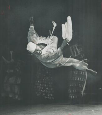 Mid-Air swoop in which a performer plucks a hand-kerchief from the floor while flying horizontally through the air was one of the athletic highlights (...)