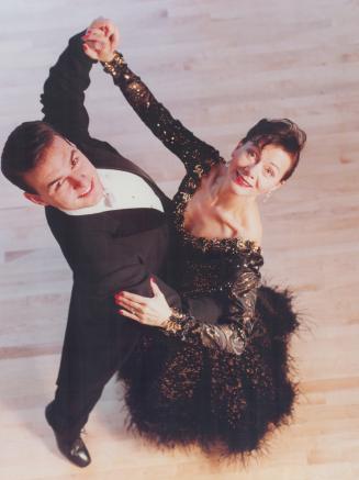 High step: Norma King and David Doma trip the light fantastic, joining a growing group enjoying ballroom dancing, which today has two divisions - modern and latin