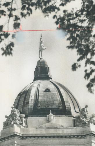 The golden boy, atop the legislative building, is the city's best known landmark