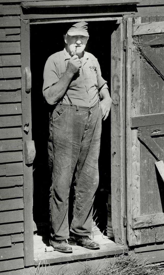 Farmer - fisherman from flat rock near St