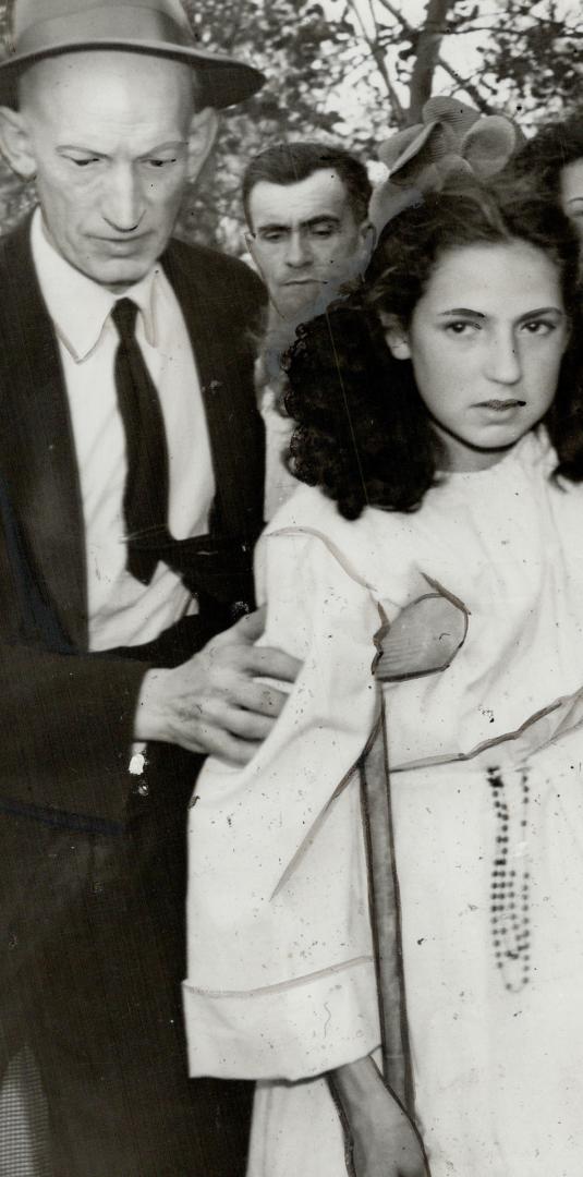Pierrette is seen here with her father