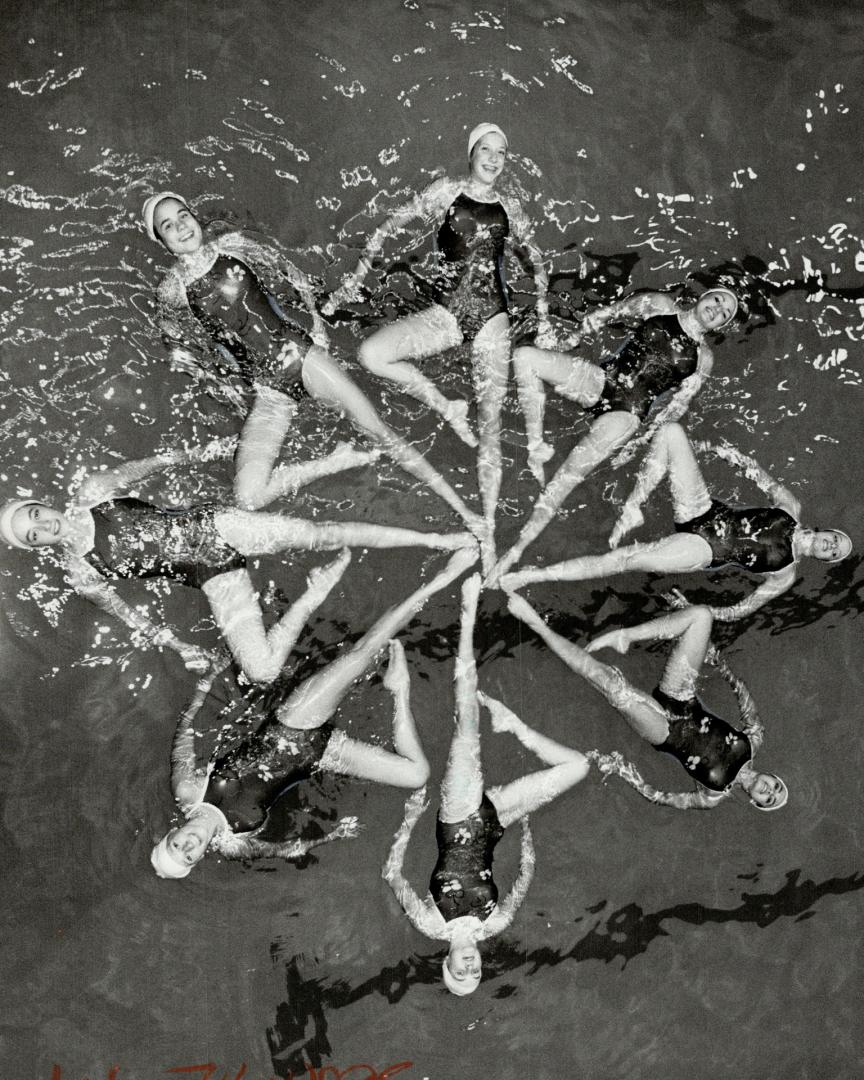 A star is born, A bird's-eye view is the best as members of the Etobicoke Olympium Synchronized Swim Club float in a star-shaped formation in the Olym(...)