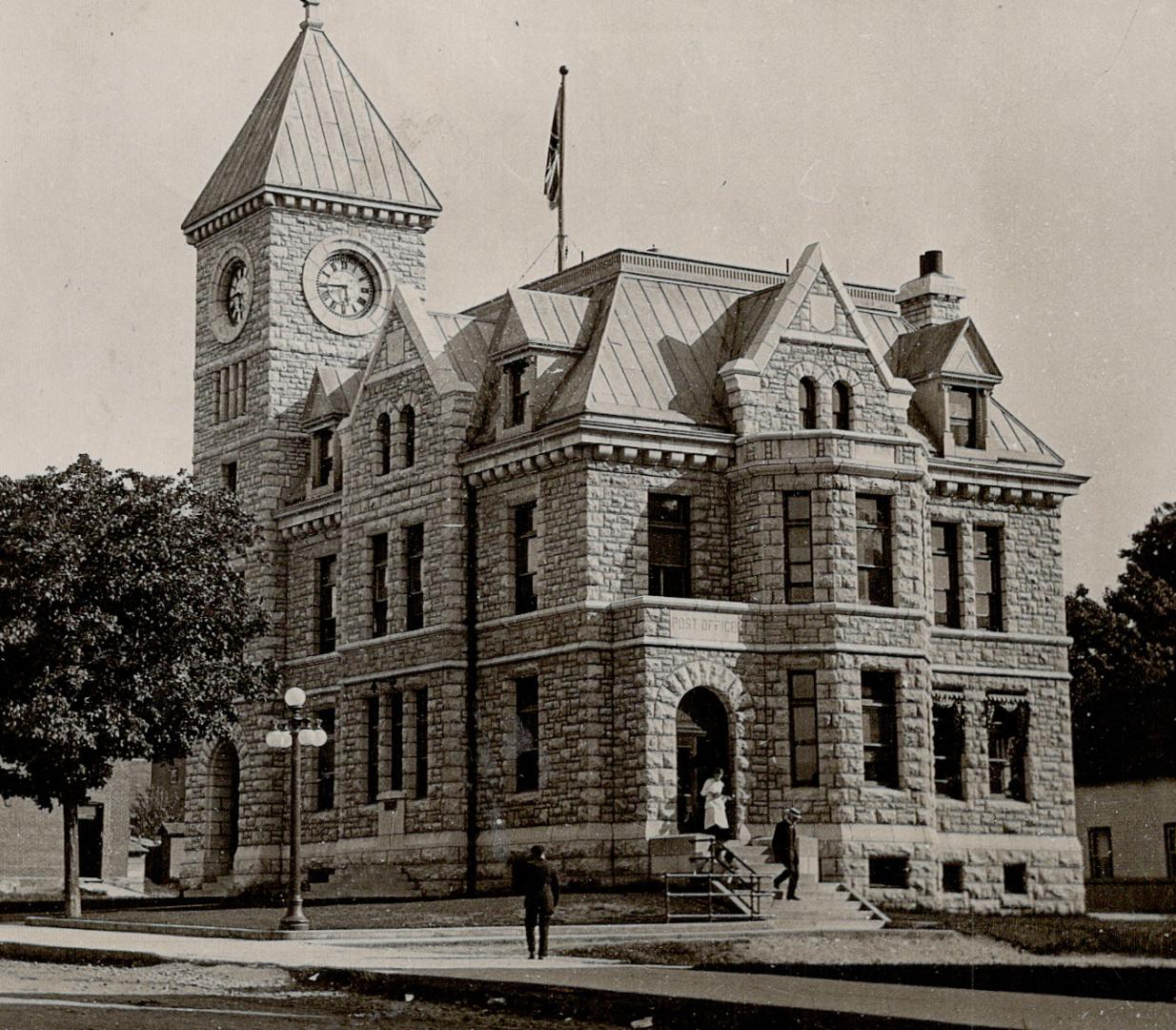 The handsome white granite town hall in Midland, Ont