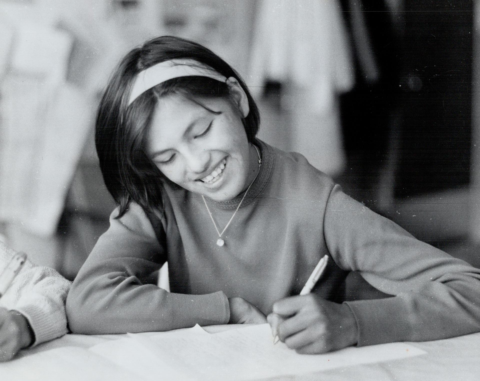 A Book-Lover At 8, Pauline Linkletter Hugs One Of The Few Volumes In ...