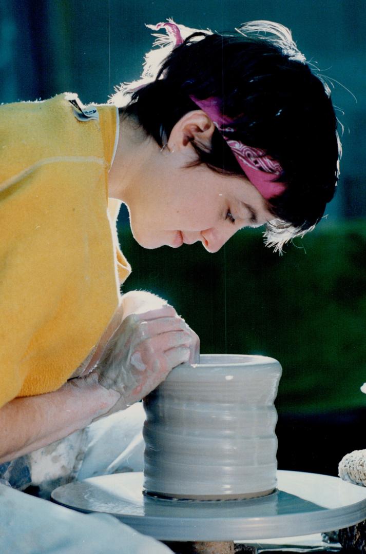 She's spinning a ceramic surprise