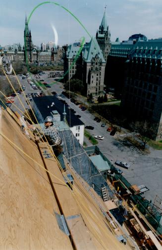 Mark Doxtater on roof of Supreme Court of Canada building to be reroofed