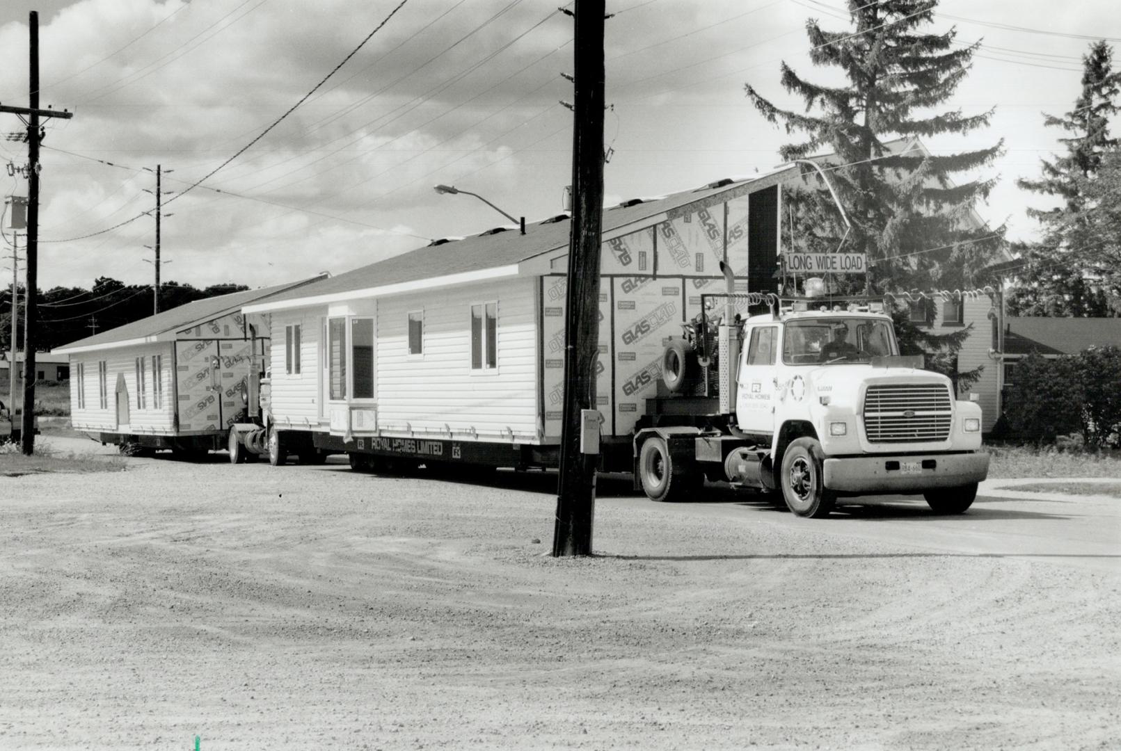 Made to order: Model homes are built, right down to bathroom sink, on an assembly line and trucked to the site