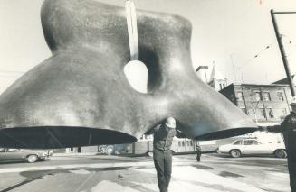 Moving an Eight-Ton Henry Moore, Lifting an eight-ton statue is really more than mover Ralph Clark can handle by himself. Blocked from view in this ph(...)