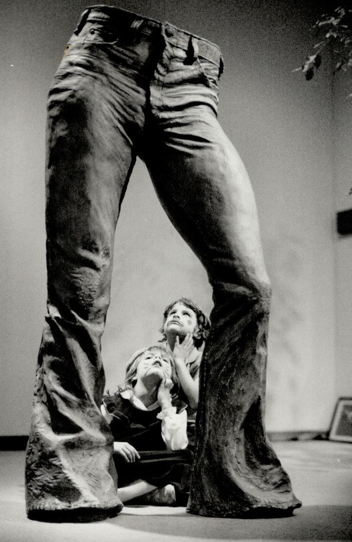 Big Jeans: Pauline LeGoff, 5, and Julia Boswell, 4, are mesmerized by Blue Jeans sculpture during Art Gallery of Ontario's annual Celebration presentation for youngsters