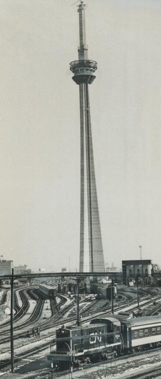 A giant needle stretching 1,800 feet above ground to dominate the skyline of Toronto