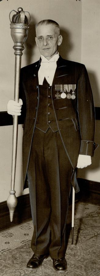Sergeant in mufti, In conventional attire instead of the glittering uniform usually worn by the sergeant-at-arms, Capt