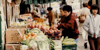 Chinese Canadians do most of their grocery shopping in markets in Chinatown