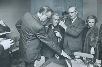Metro council tries out Bugs, From left: Charles Bick, William Allen, Mayor Dennison