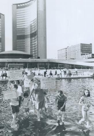 Phillips Square scene of 'Wade-In', Protesting the lack of a wading pool and other recreational equipment at Regent Park, mothers and children from th(...)