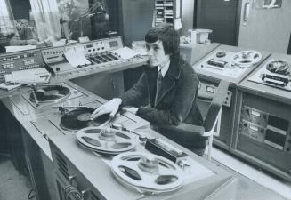Producer Ken Cox sits in Ryerson's radio station CJRT control room