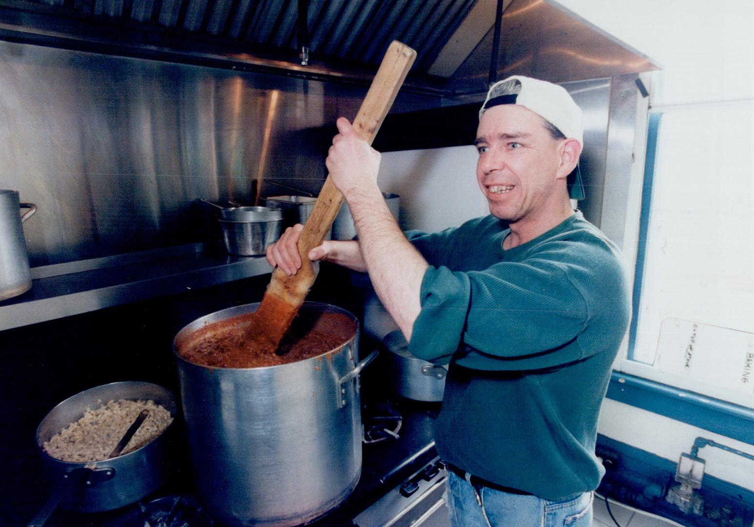 Cooking for the Sunday drop-in program, Robert Schulz