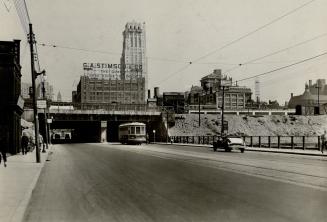 Showing Bay Street Subway on 4th July 1930, through which waterfront traffic passes uptown and street cars carry passengers direct to and from the steamship and ferry docks