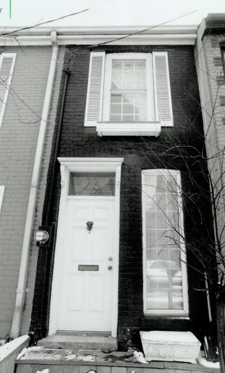 Tiny facade: Row house door leads to Paul King's diminutive domicile