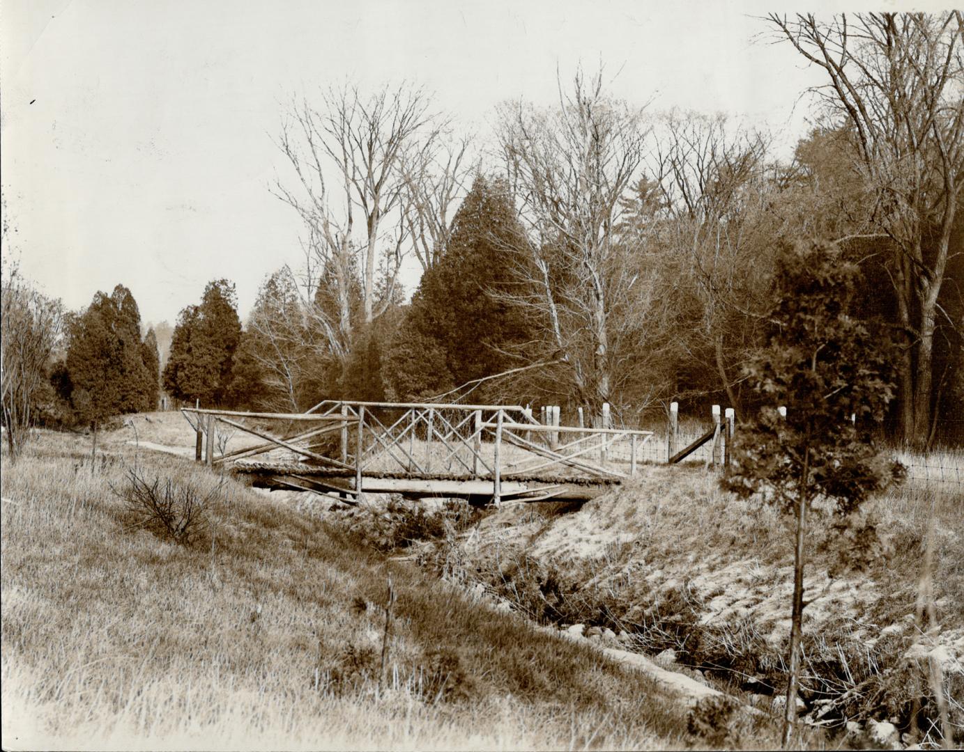Sunnybrook farm picturesque rustic bridge over one of she winding creeks