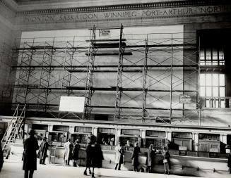 Scaffolding has been erected before the northwest wall of the Union station where the 26 by 58-foot mural is to be executed. Mrs. Squire's mural won a(...)