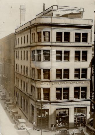 New stock exchange building. Above is a photograph of the building at he northeast corner of King and Victoria Sts., which is reported as in process o(...)