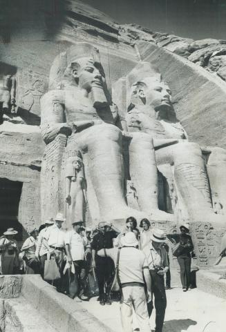 Rameses II and his wife tower far above mere mortals