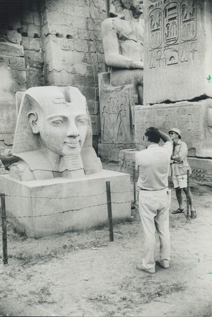 The giant head of a Pharaoh outside Luxor is more than 3,000 years old