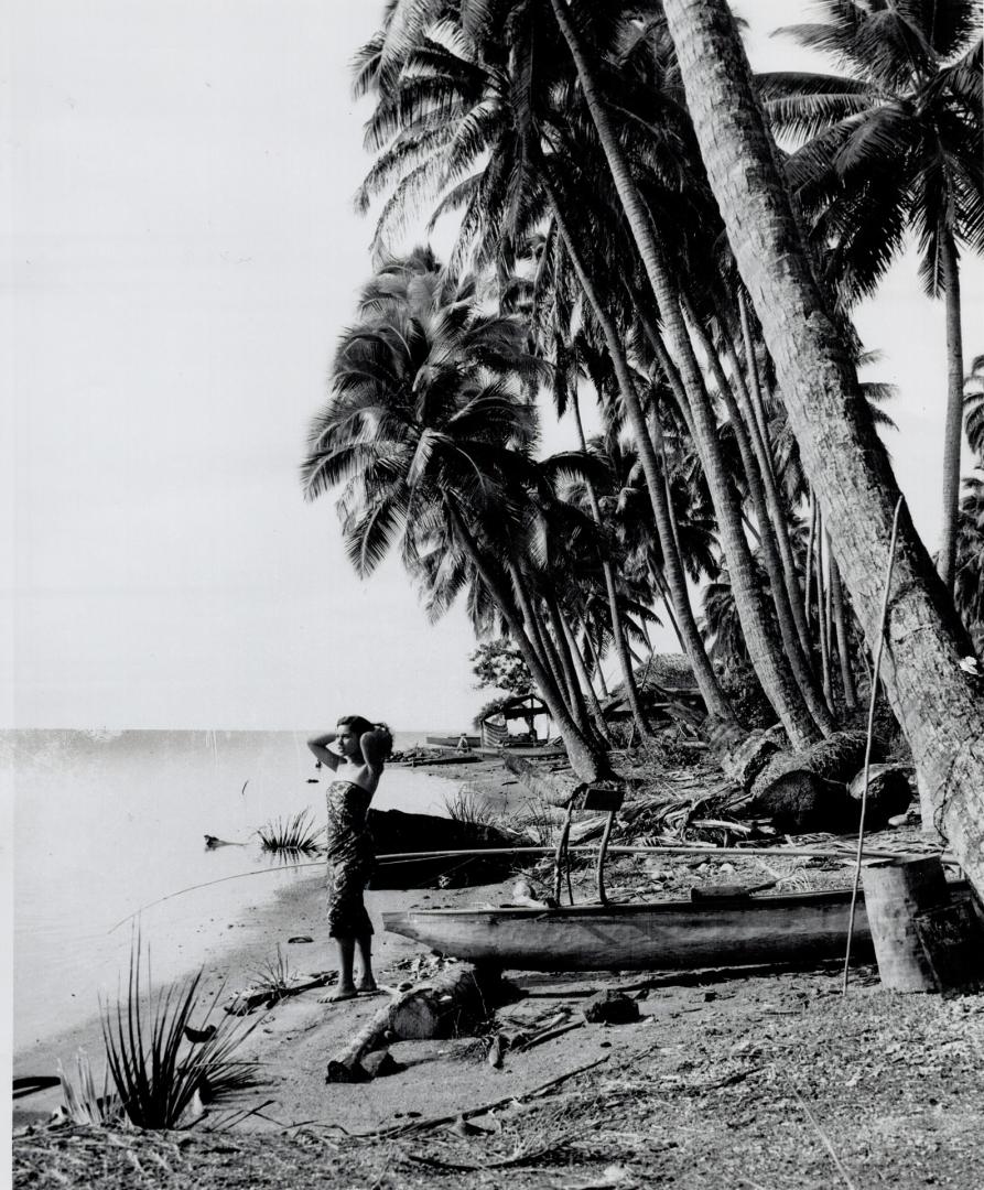 Tahiti of memory: Willowy girl, palm trees and warm sea