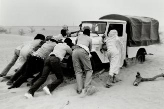 Rover Stuck in sand carring food for refuges near Rosso, Mauritania