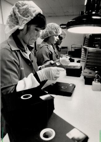 On the job: Women in TDK floppy disc factory in Tijuana, which has attracted many firms