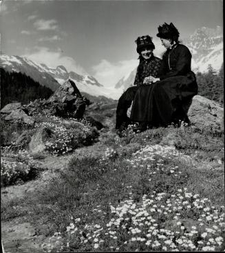 Carpeted with early flowers, a mountainside is a nice quiet spot for a Sunday afternoon chat