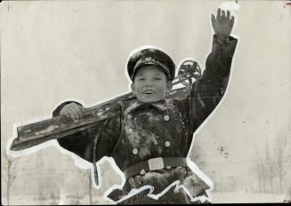 The Soviet trade school student smiles happily after winning the school skiing championship