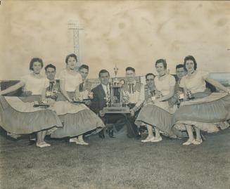 For second year in row Bob Lang's Coronation dance team from Caledonia won The Toronto Star Trophy for the Ontario square dance championship last nigh(...)