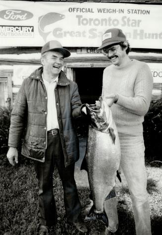 Leviathan lunker, Stanley Drak, left, and son Michael of Toronto show off the 28