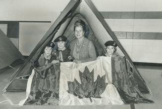 New colors, Brian Trerice, 11, David Swantko, 10, and Scott Tilley, 11, show off the new flag presented to the 1st West Rouge Scout Troop by Margaret (...)