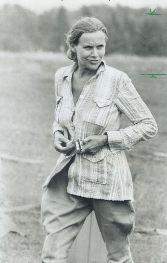 Honor Blackman, relaxes on the set of Summer Rain, being filmed in the Kawartha Lake district