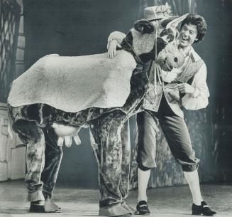 English panto star Lionel Blair has an exchange of jokes with Daisy the Cow (who, incidentally, couldn't keep her udders on) in Jack And The Beanstalk(...)