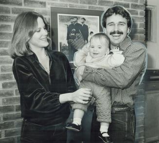 Apres win: Blue Jays catcher Pat Borders, wife Kathy and their daughter  Lindsay, 22 months, enjoy a meal after Toronto clinched a division title  yesterday – All Items – Digital Archive Ontario