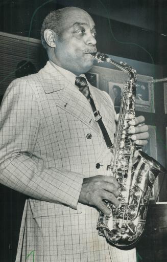 Saxophonist Benny Carter, He plays at George's Bourbon Street for the week