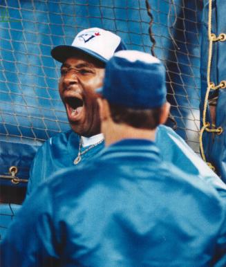 Jolly Joe: Blue Jay outfielder Joe Carter erupts in laughter after a slight  snafu over the