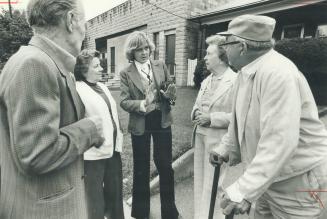 Acting as mediator in a neighborhood dispute, York Alderman Gayle Christie, centre, reasons with residents Jim and Alice Lindsay, left, and William an(...)