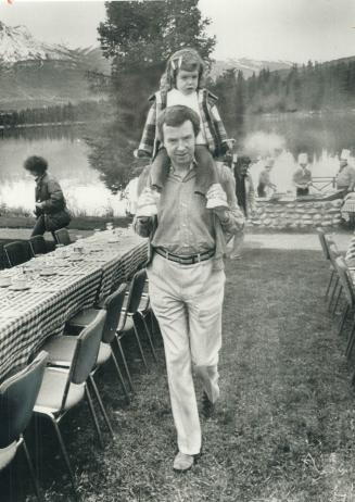 Joe Clark and daughter Catherine of at a barbecue at his Jasper Park Lodge retreat