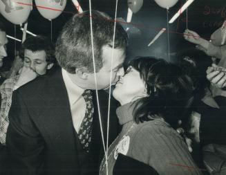 Puckered out. Prime Minister Joe Clark puckers for the party with Linda Eby in a campaign swing through Barrie. Buoyed by the rescue of six U.S. offic(...)