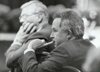 Nail-biting time: Constitutional Affairs Miniter Joe Clark, who must put his finger on a recipe for Canadian unity, is deep in thought at yesterday's conference
