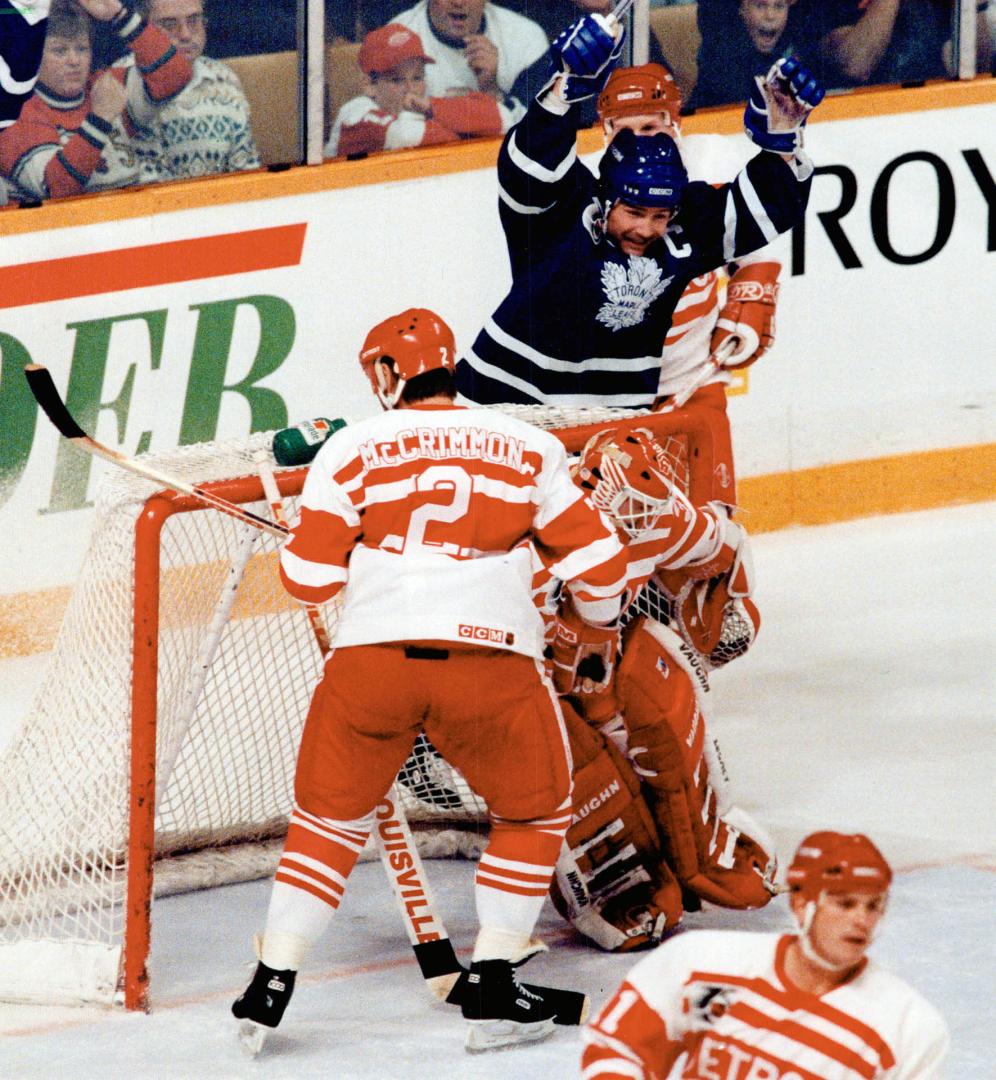 Rare goal: Leaf captain Wendel Clark celebrates a goal by Brian Bradley -  his first ever for