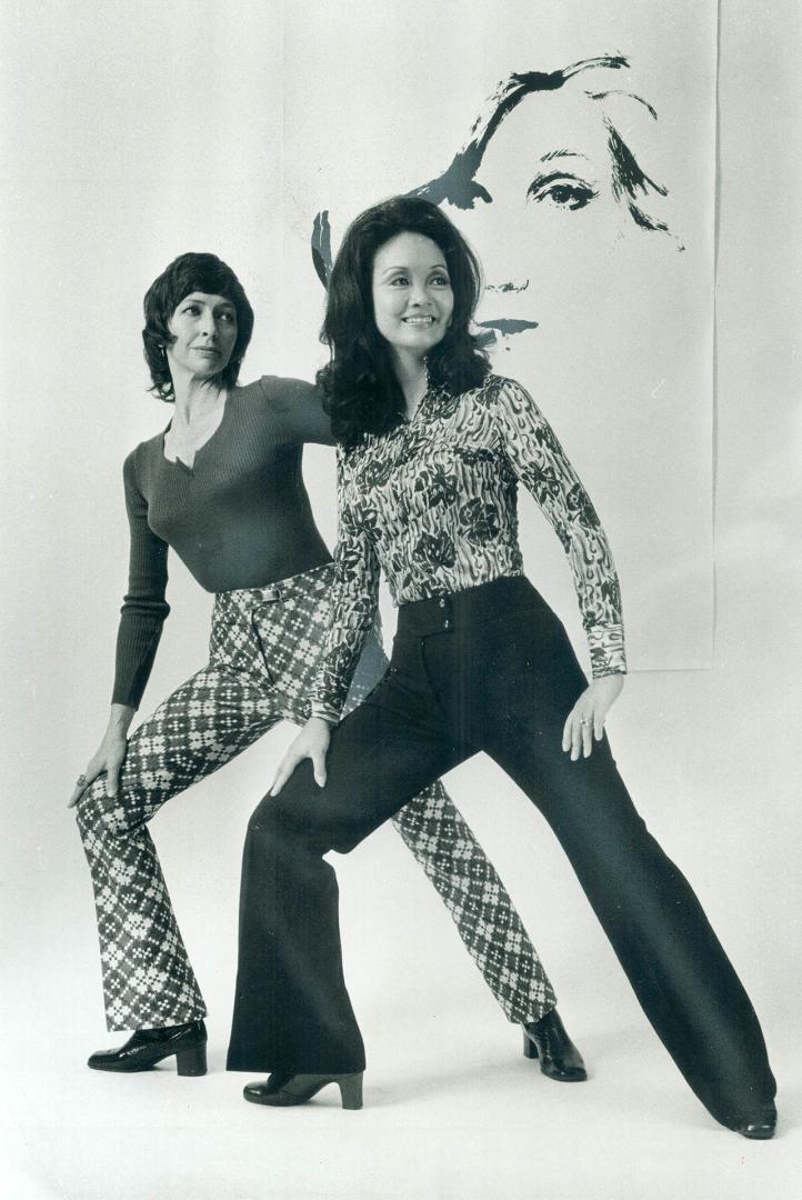 Lois Smith models jacquard apres-ski pants with body sweater while Adrienne Clarkson wears international look of black knit pants combined with clingy print skirt