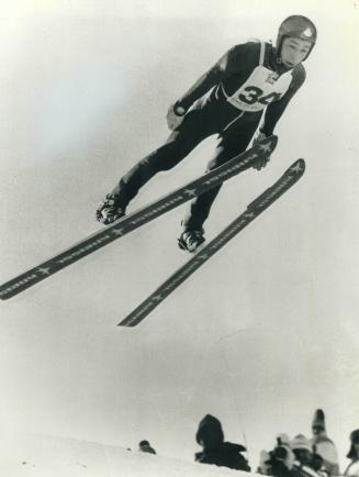 Canada's Stephen Collins went flat out yesterday in the 70-metre men's ski jump