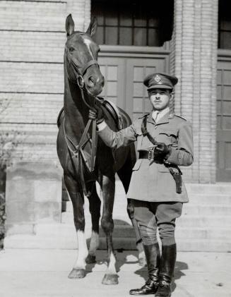Three sons of Mr. Cleland served overseas, one of them dying in action. This is Marshall Cleland, noted horseman