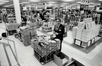 A big one, Jack Cole, president of Coles bookstore chain, stands inside World's Biggest Bookstore, scheduled to open to the public Wednesday. The stor(...)