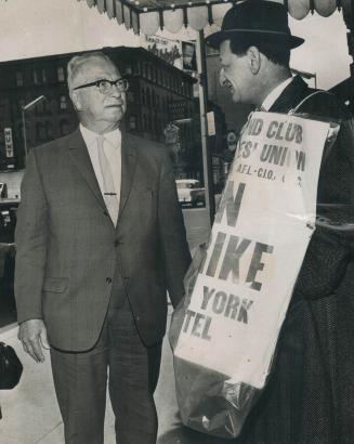 Daley crosses line. Ontario Labor Minister Charles Daley (left) passed through the picket line outside the struck Royal York hotel today to keep a speaking engagement
